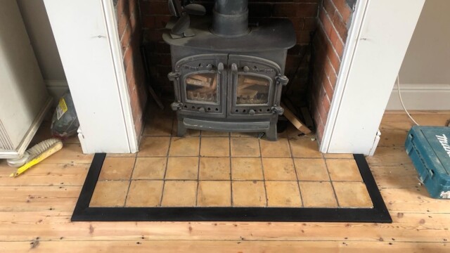 Fireplace surround hand stained with vinegar and iron solution