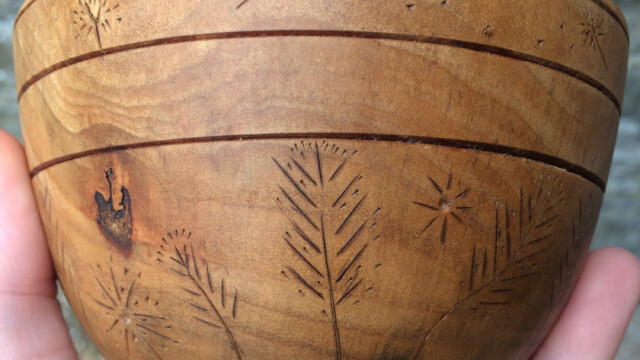 Hand turned bowl with chip carved decoration